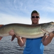 Nathan Lassonde with a huge 49.5" Musky from Lac Seul